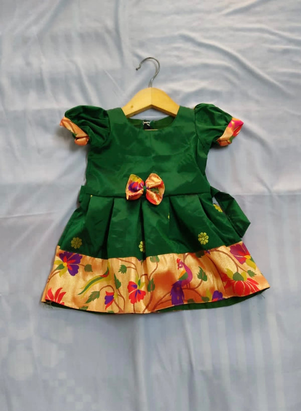 Girls premium green paithani frock with golden Border and puff sleeves