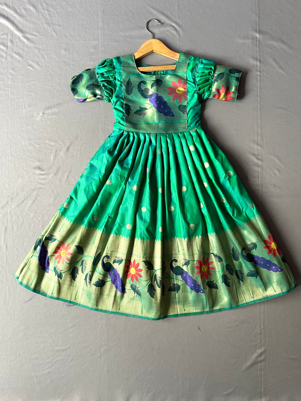 Girls premium dual green paithani frock with peacock Border and puff sleeves