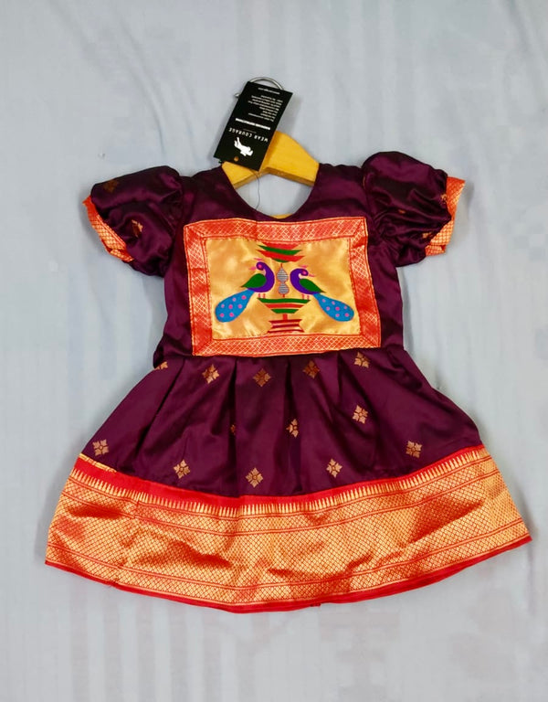 Girls premium wine paithani frock with red Border and puff sleeves