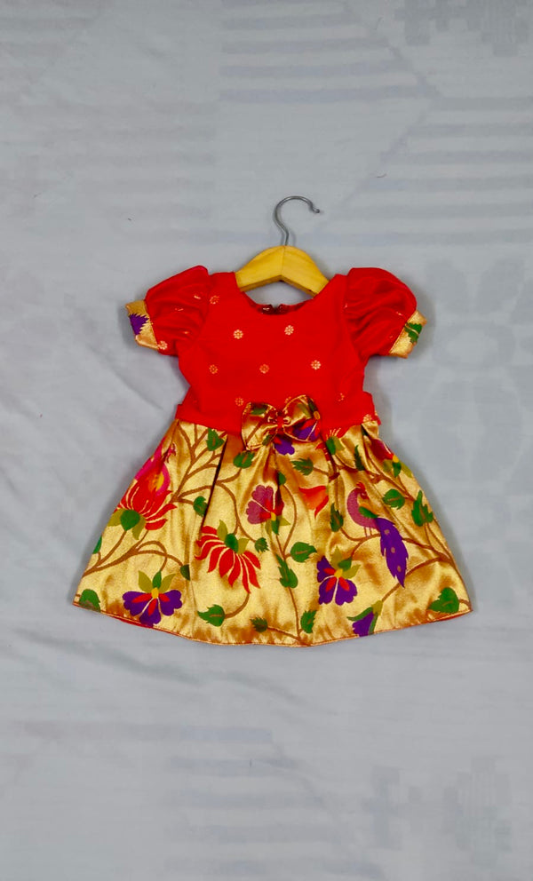 Girls premium red paithani frock with golden Border and puff sleeves