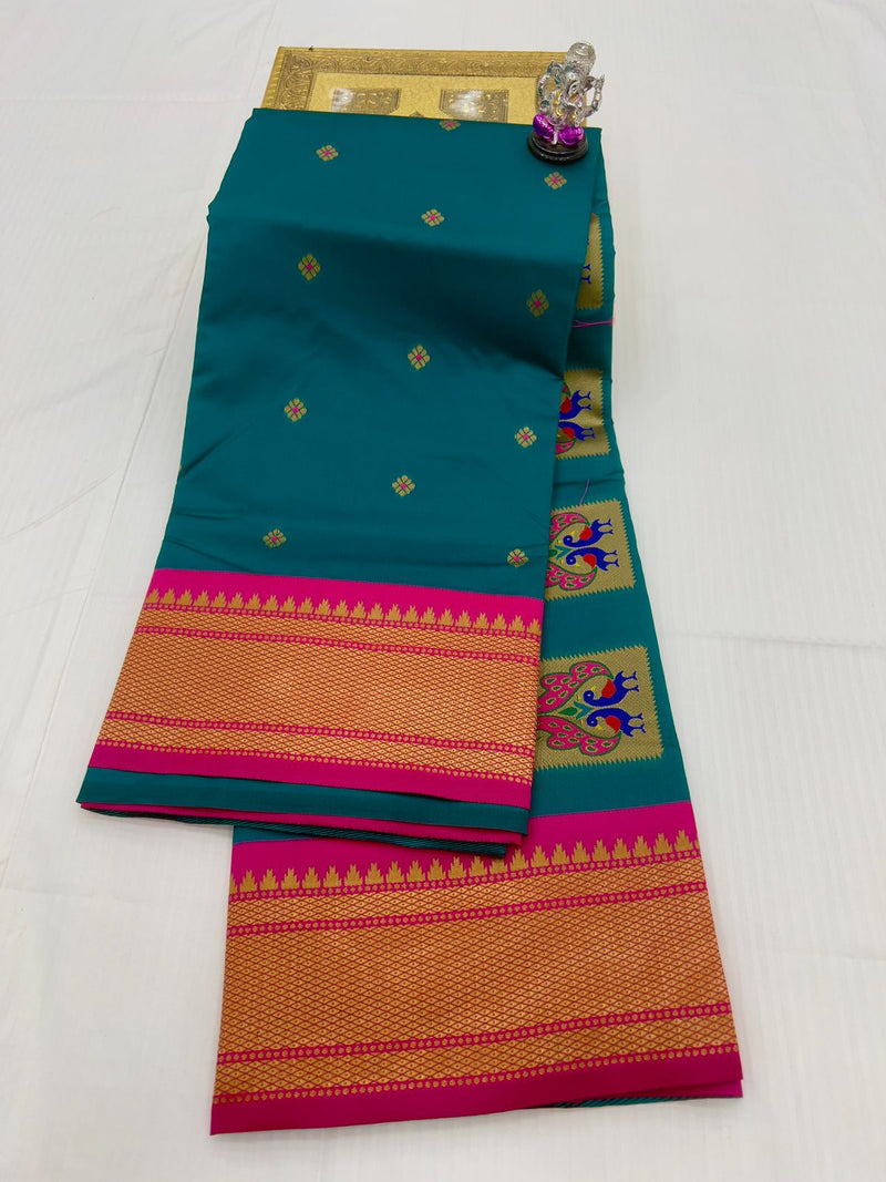 Premium Peacock pallu paithani saree - color turquoise blue with pink border