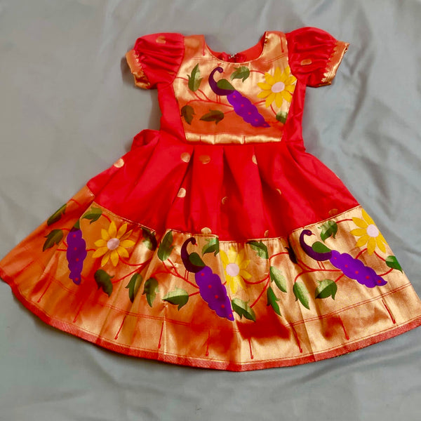Girls premium red paithani frock with peacock Border and puff sleeves