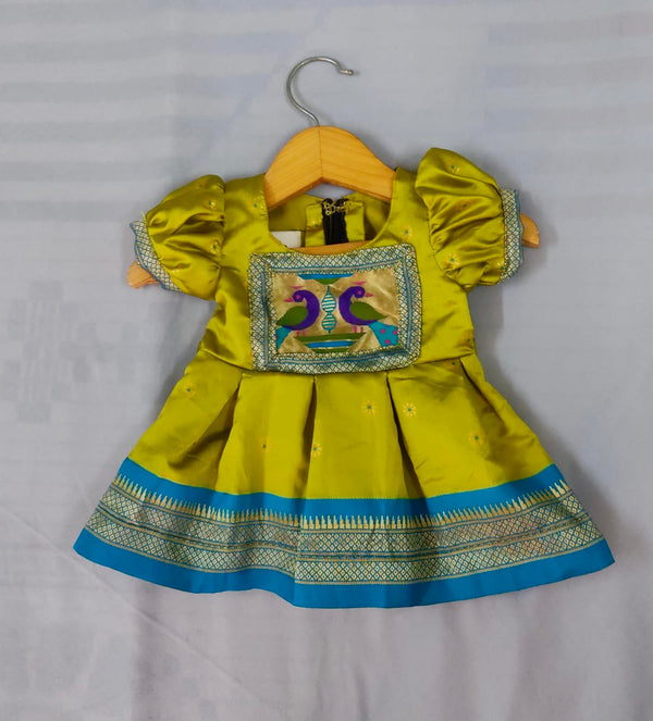 Girls premium light green paithani frock with blue Border and puff sleeves